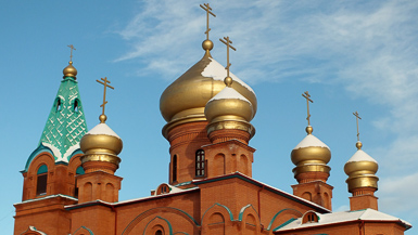golden domes and crosses of Siberian church